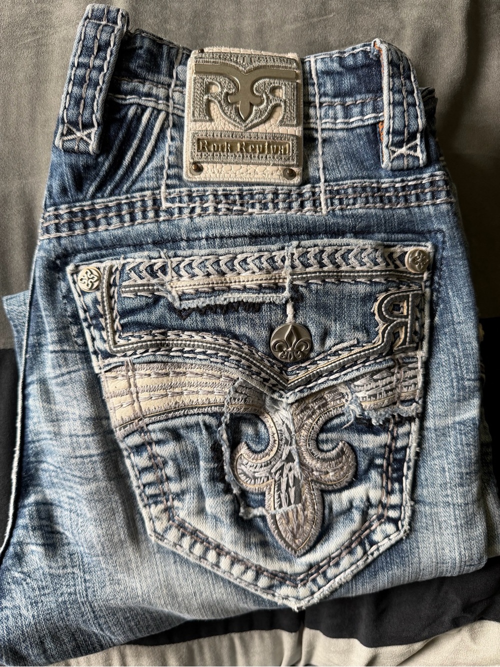 Rock Revival Men’s Kidd Slim Straight Blue Embroidered Pocket Jeans